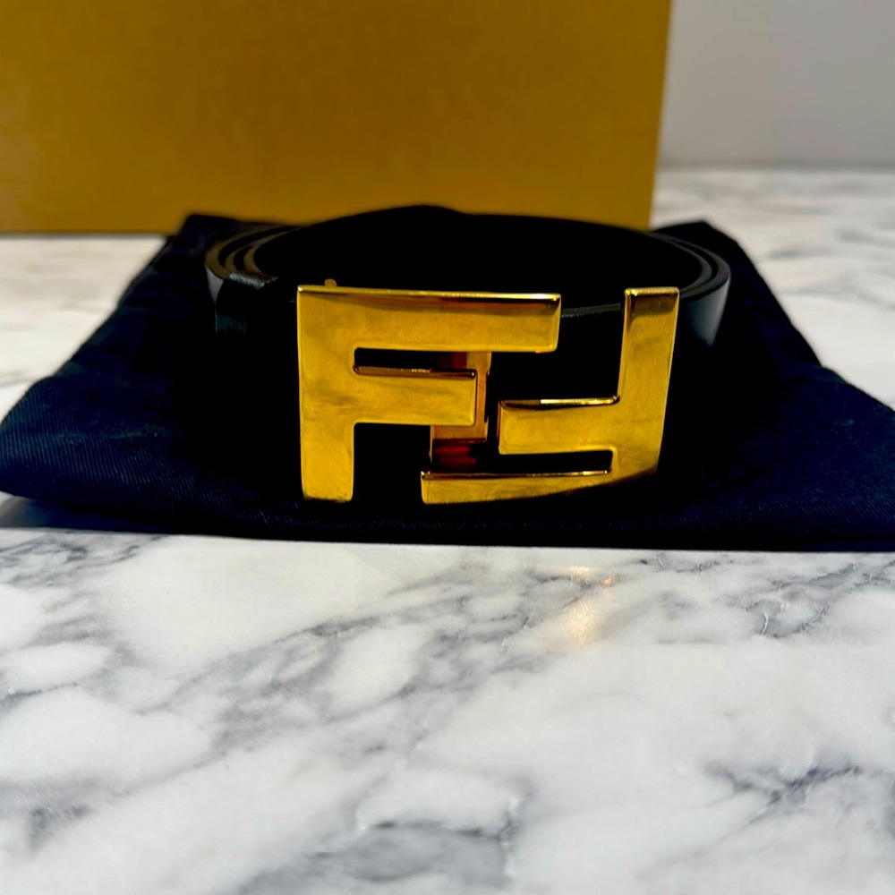 Black and gold Fendi belt